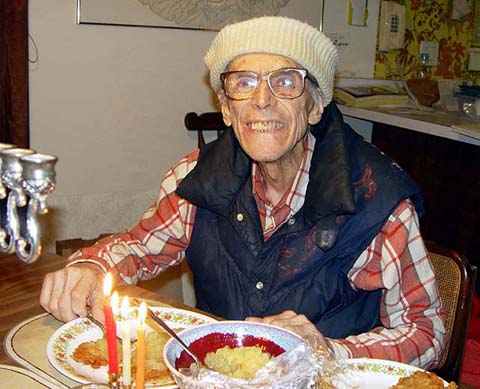 Hal enjoying latkes at Hannukah, December 2006